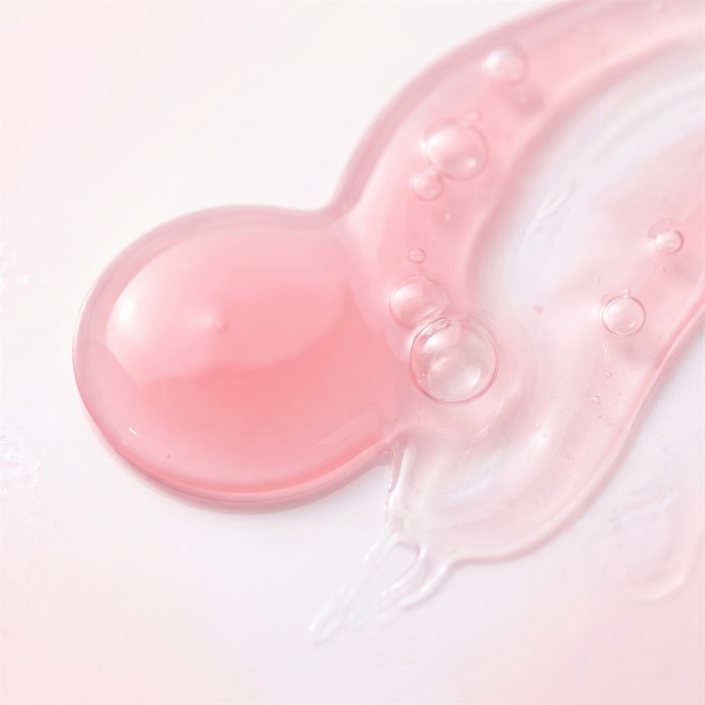 Textura del serum rosado