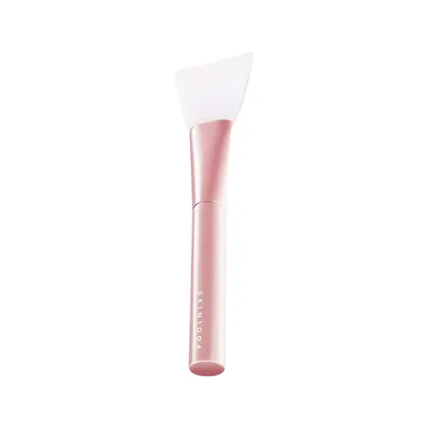 SKIN1004 Soft Mask Brush aplicador con punta de silicona y mango rosa